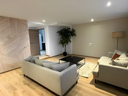 Salon rénovée dans une maison nantaise avec réagencement complet des volumes- St Sébastien sur Loire