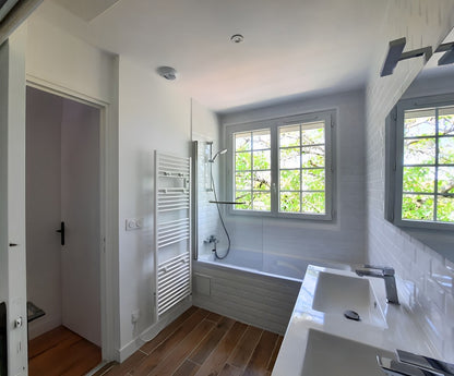 Photo d'une salle bains après rénovation à basse goulaine